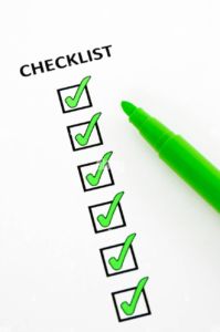 checklist of completed tasks with green felt pen WX1RHG
